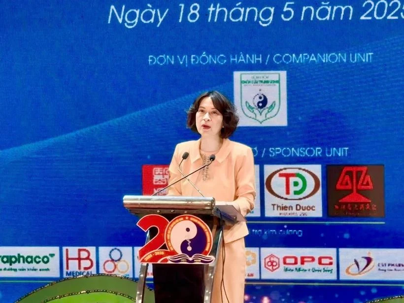 La vice-ministre de la Santé, Nguyen Thi Lien Huong s'exprime à la conférence scientifique. Photo: Vietnam+