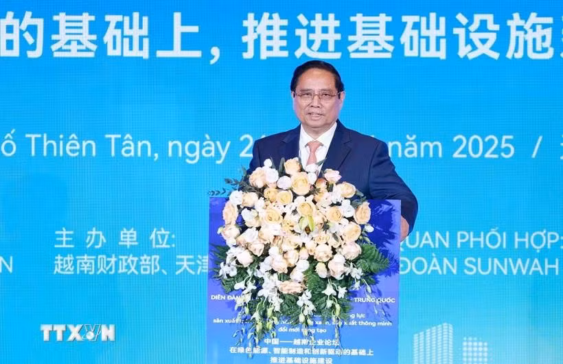 Le Premier ministre Pham Minh Chinh s’exprime lors du Forum de connexion d'affaires Vietnam–Chine à Tianjin. Photo: VNA