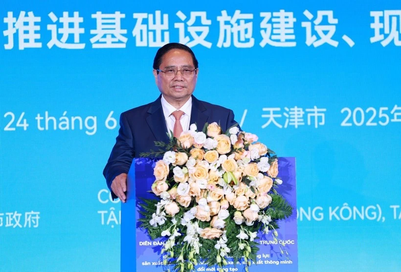 Le Premier ministre Pham Minh Chinh s'exprime lors du Forum des entreprises Chine-Vietnam. Photo: VNA