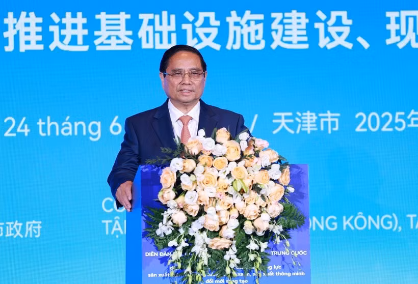 Le Premier ministre Pham Minh Chinh s'exprime lors du Forum des entreprises Chine-Vietnam. Photo: VNA