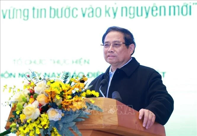 Le Premier ministre Pham Minh Chinh au dialogue avec les agriculteurs, le 31 décembre. Photo: VNA