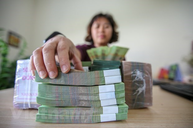 Lors des deux premiers mois de l'année 2026, les recettes budgétaires totales de l'Etat ont atteint 601.300 milliards de dongs. Photo: Vietnam+