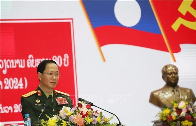 Le ministre lao de Défense, Khamlieng Outhakaysone, s'exprime au meeting à Vientiane en l’honneur du 80e anniversaire de l’Armée populaire du Vietnam. Photo: VNA