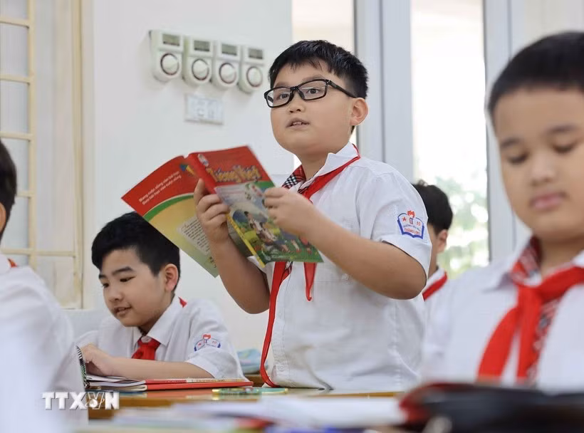 Les élèves vietnamiens se sont distingués au cycle 2024 du SEA-PLM, obtenant les meilleurs scores régionaux en mathématiques et en lecture. Photo: VNA