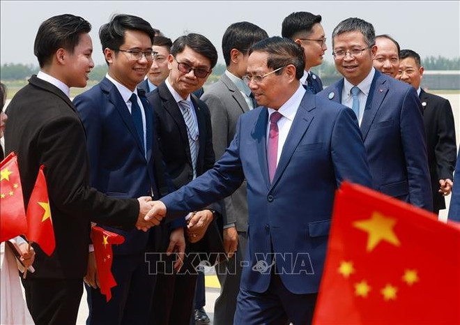 Cérémonie d'accueil du Premier ministre Pham Minh Chinh à Tianjin. Photo: VNA chinh-2.jpg
