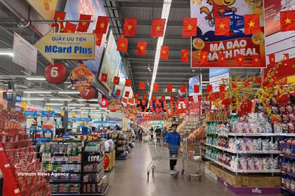 La part des produits vietnamiens reste élevée dans les supermarchés. Photo : VNA