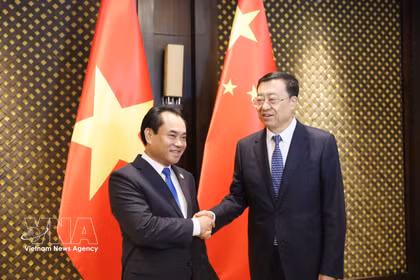 Le ministre de l'Agriculture et de l'Environnement, Trinh Viet Hung (à gauche) et le ministre chinois de l'Agriculture et des Affaires rurales, Zhang Zhu. Photo : VNA