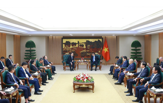 Le Premier ministre Pham Minh Chinh reçoit le 21 mai à Hanoï Zhou Jiayi, président de PowerChina Asie-Pacifique. Photo: VNA vna-potal-thu-tuong-tiep-chu-tich-khu-vuc-chau-a-thai-binh-duong-cua-tap-doan-xay-dung-dien-luc-trung-quoc-8044852.jpg