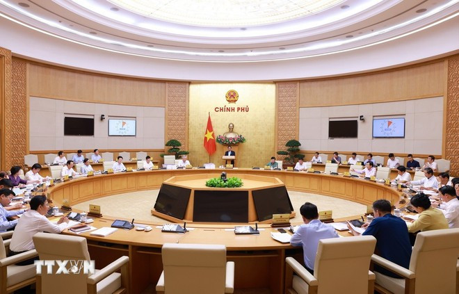 Réunion sur la réorganisation des unités administratives. Photo: VNA thu-tuong-pham-minh-chinh-chu-tri-cuoc-hop-chinh-phu-chuyen-de-ve-viec-sap-xep-don-vi-hanh-chinh-cac-cap-8021748.jpg