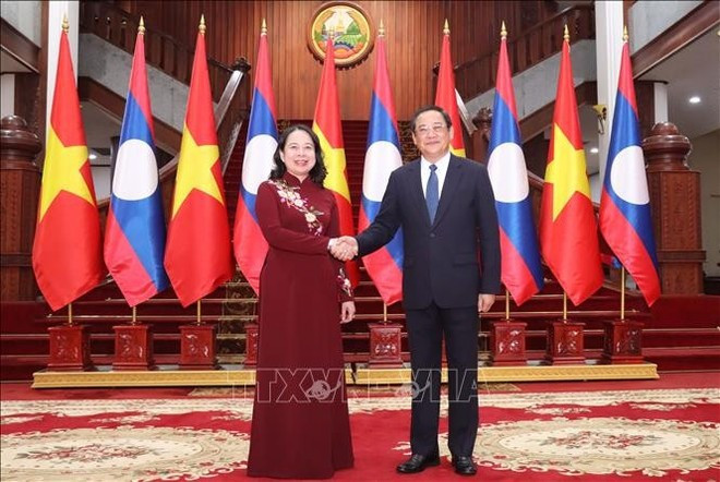 La vice-présidente vietnamienne Vo Thi Anh Xuân et le Premier ministre lao Sonexay Siphandone. Photo: VNA thu-tuong-lao.jpg