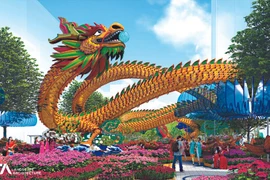 Deux dragons géants tiennent la vedette dans la rue florale Nguyên Huê