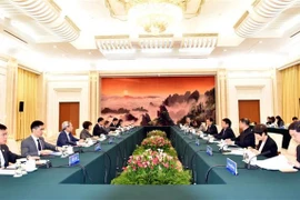 Vietnam-Chine : Expériences croisées sur les affaires financières et économiques