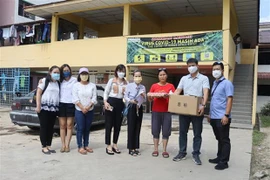 ​Soutien aux Vietnamiens touchés par les inondations en Malaisie 