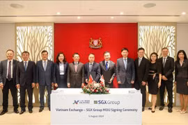 Délégués lors de la cérémonie de signature. Photo: VNA