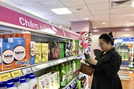 Plusieurs consommateurs de Hô Chi Minh-Ville privilégient les produits écologiques. Photo: VNA