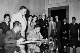 Signature de l'accord sur la cessation des hostilités au Vietnam. Les accords similaires concernant le Cambodge et le Laos ont été signés après. Photo: archives de la VNA