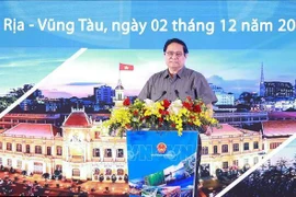 Le Premier ministre Pham Minh Chinh lors de la conférence. Photo: VNA