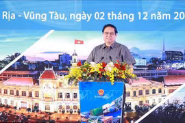 Le Premier ministre Pham Minh Chinh lors de la conférence. Photo: VNA