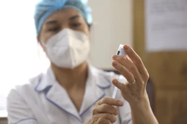Le Vietnam envisage de vacciner les enfants contre le COVID-19 en octobre