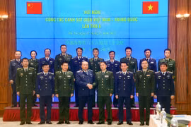 Vietnam-Chine : les Garde-côtes promeuvent leur coopération dans l'application de la loi maritime