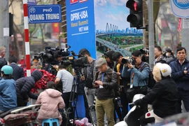 Des centaines de journalistes attendent le président nord-coréen Kim Jong-un