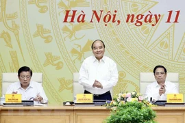 Réunion sur l’édification et le perfectionnement de l'État de droit socialiste au Vietnam
