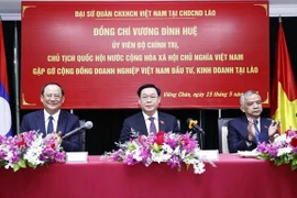Les entreprises sont invitées à aider à faire des percées au liens économiques Vietnam-Laos