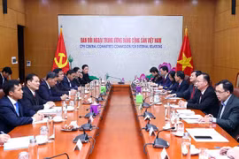 Le Vietnam et le Laos partagent des expériences dans la mobilisation des masses