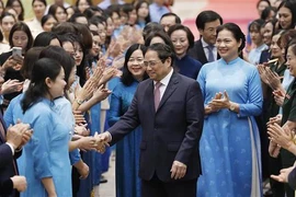 Le Premier ministre Pham Minh Chinh préside un Dialogue avec des femmes