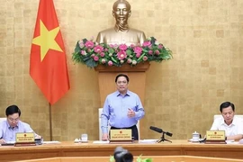 Le PM Pham Minh Chinh préside la réunion périodique du gouvernement sur l'édification de la loi