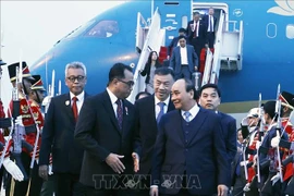 Le président Nguyên Xuân Phuc arrive à Jakarta pour sa visite d’Etat en Indonésie