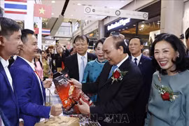 Le président Nguyên Xuân Phuc inaugure la Semaine des produits vietnamiens en Thaïlande 2022