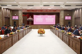 Hanoï échange des expériences en matière d’édification du Parti avec le Laos