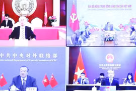 Renforcement de la coopération entre les deux Partis communistes du Vietnam et de Chine