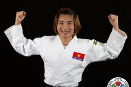 La judoka vietnamienne Hoang Thi Tinh obtient un billet pour les Jeux Olympiques (JO) de Paris 2024. Photo: IJF