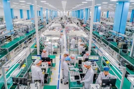 Le Vietnam demeure une destination de choix pour les investissements directs étrangers, selon HSBC. Photo: VietnamPlus