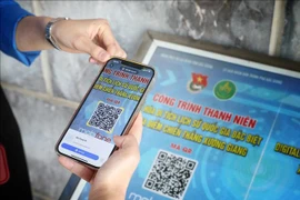 Scanner le code QR pour en savoir plus sur le site spécial national de la victoire de Xuong Giang. Photo: VNA