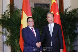 Le PM Pham Minh Chinh rencontre un haut dirigeant chinois
