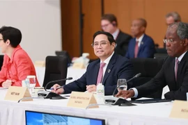 Le PM Pham Minh Chinh s’adresse à la 2e session du Sommet du G7 élargi