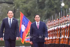 La presse lao couvre la visite officielle au Laos du PM Pham Minh Chinh