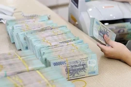 À partir du 1er décembre, les transactions à partir de 400 millions de dôngs doivent être déclarées à la Banque d'État