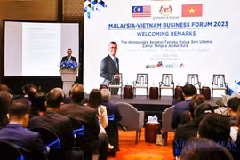 Le Premier ministre malaisien participe à un Forum d’affaires Vietnam-Malaisie
