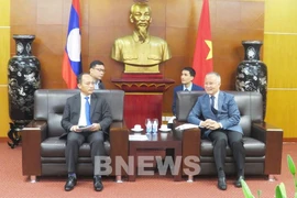 Le Vietnam échange avec le Laos ses expériences face aux difficultés économiques