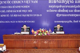 Vietnam et Laos partagent des expériences en matière de développement économique post-pandémie