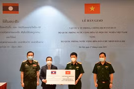 COVID-19 : aide contenue du ministère vietnamien de la Défense à son homologue lao