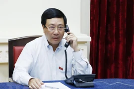 Conversation téléphonique entre le vice-PM Pham Binh Minh et le chef de la diplomatie singapourienne