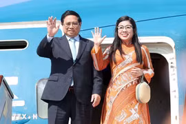 Le Premier ministre Pham Minh Chinh et son épouse. Photo : VNA
