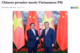 L'Agence de presse Xinhua et la Télévision centrale de Chine couvrent de l'entretien entre le Premier ministre Pham Minh Chinh et son homologue chinois Li Qiang. Photo: VNA
