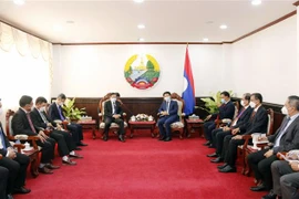 Fête nationale du Laos: Félicitations de l’ambassadeur du Vietnam 