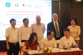 Signature d'un projet pour assister des acteurs des chaînes de valeur des légumes et du porc 